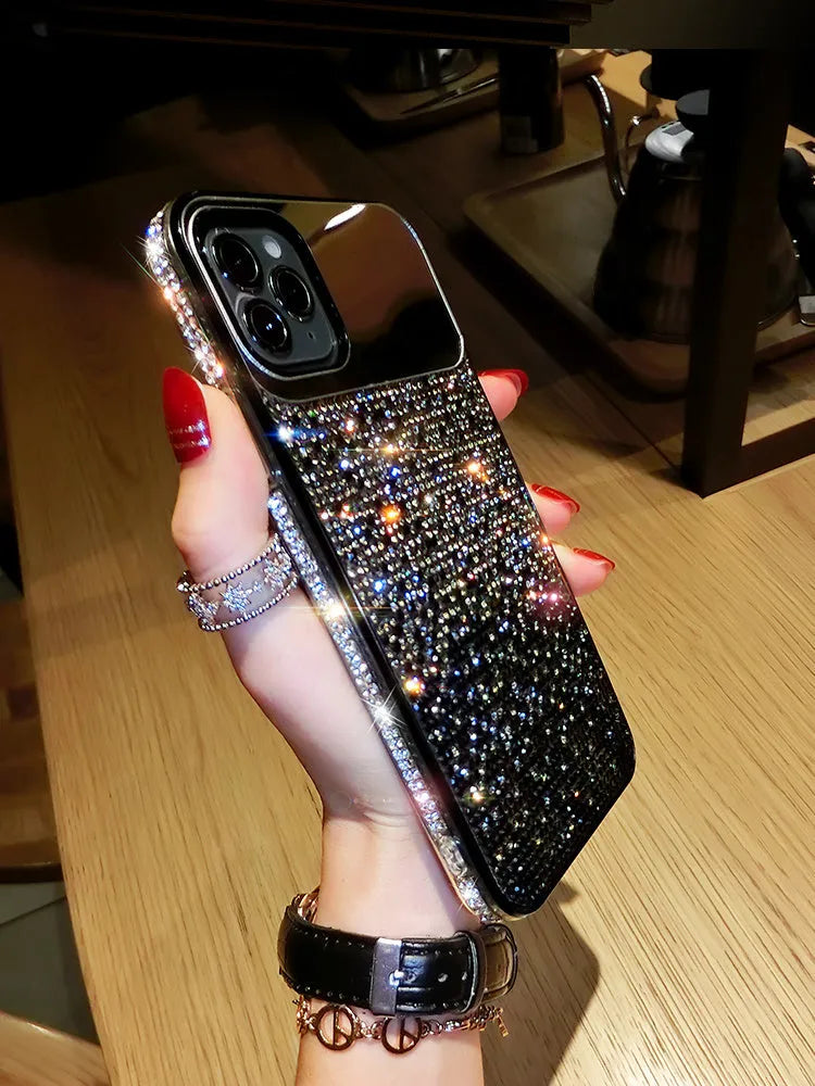 Gradient rhinestone silicone iPhone case for Apple models, available in blue, black, and purple.