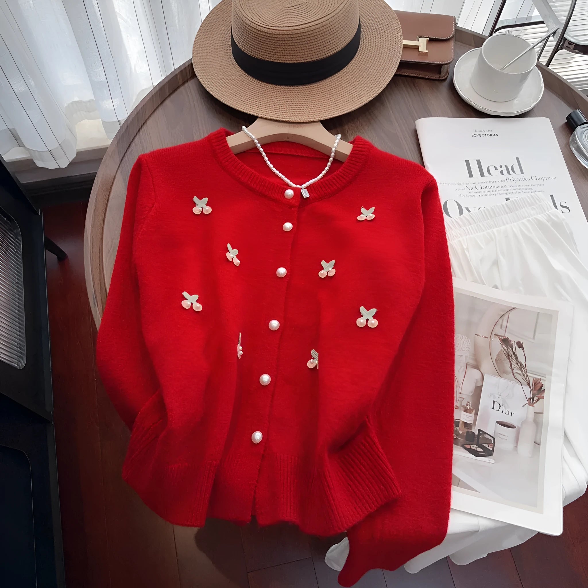 Women's slim fit beaded cardigan coat in cashmere blend, shown in blue, pink, red, and white colour options.