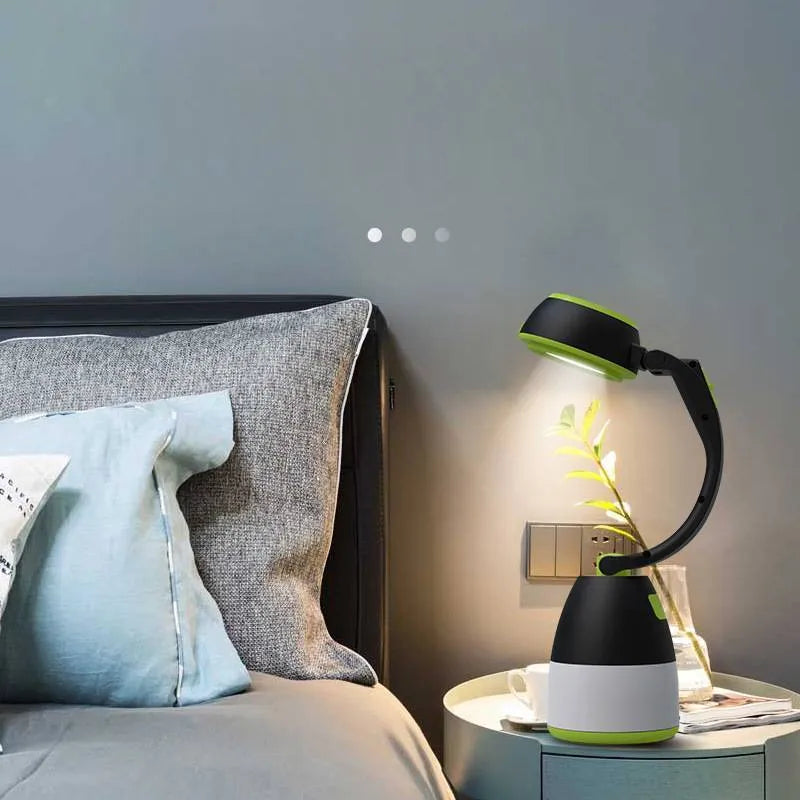 Black green multifunctional LED table lamp showing adjustable head and USB charging port