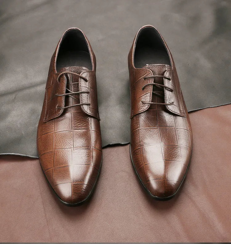 Men's black leather derby shoes with checkered detailing and pointed toe