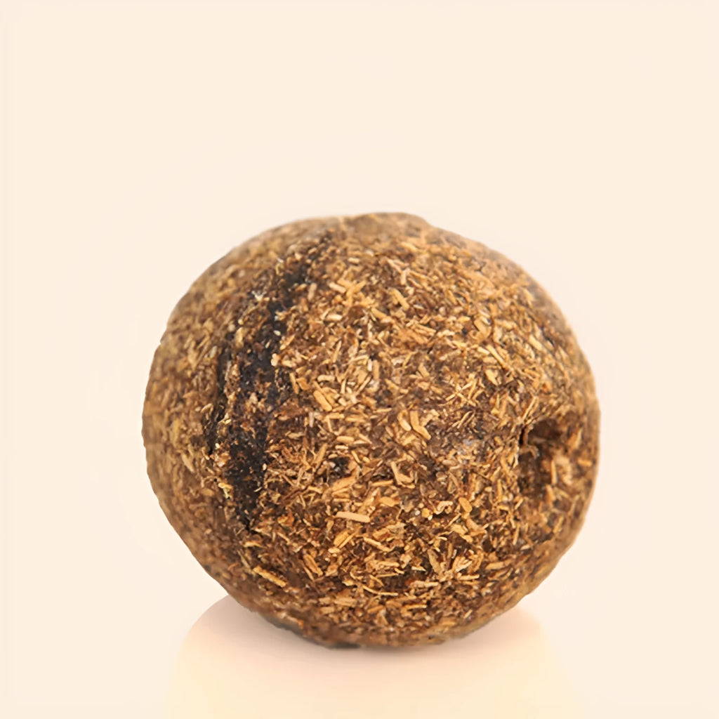 Natural catnip treat ball for cats, with catnip scent inside, on a neutral background