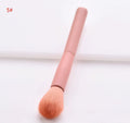 10 professional makeup brushes with wooden handles in a pink case including foundation, powder, and dual-ended brushes