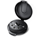 Black magnetic 3-in-1 car phone holder and portable charger with retractable cable on a car dashboard.