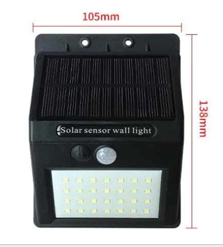 Solar sensor light with 20 LED beads and infrared sensor on a wall in outdoor setting