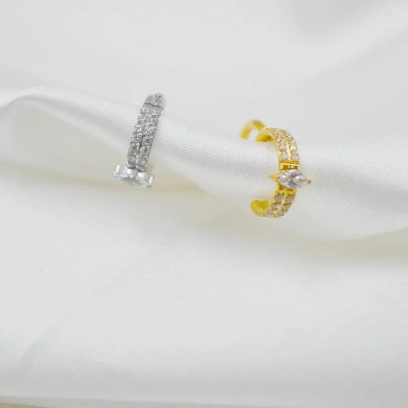 Gold and silver titanium steel heart-shaped earrings with zircon stones measuring 1.2x8mm