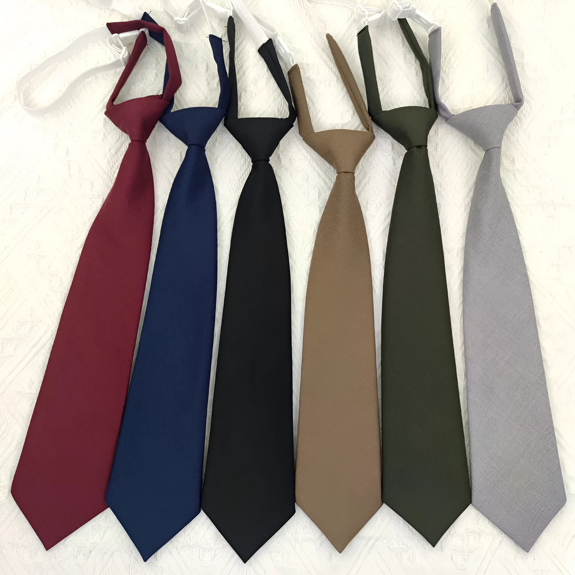 Men's navy blue cotton bow tie with arrow-style design measuring 35cm by 7cm