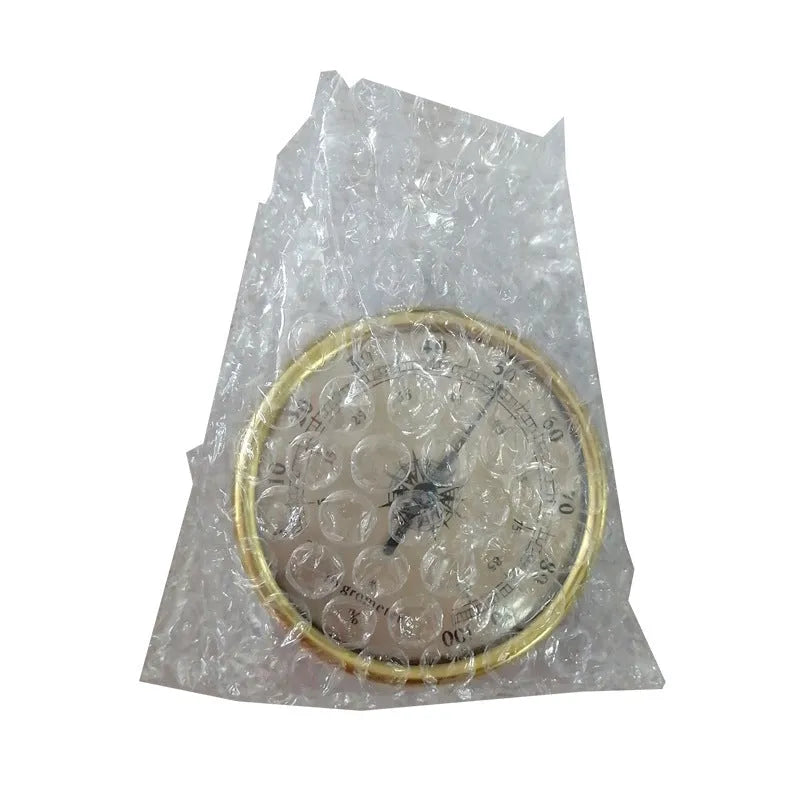 Analogue thermometer and hygrometer with aluminium dial showing humidity and temperature readings