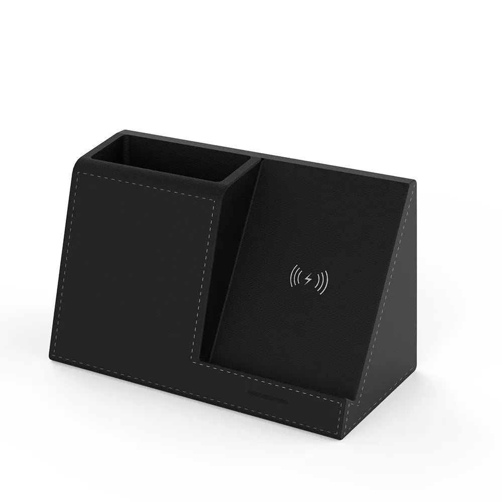 Black leather wireless charging station with phone on stand and pens in holder