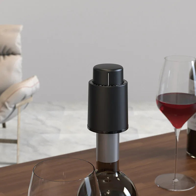 Red electric wine bottle opener set with ABS plastic base, decanter, and vacuum stopper