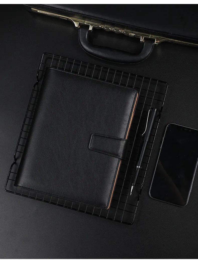 A5 hardcover PU binder notebook with metal buckle clip, shown in multiple colours.