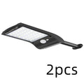 Black solar-powered outdoor wall light with motion sensor and 36 LEDs on an adjustable mount.