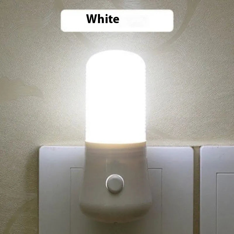 Minimalist plug-in bedside night light showing dual-colour switch and American plug