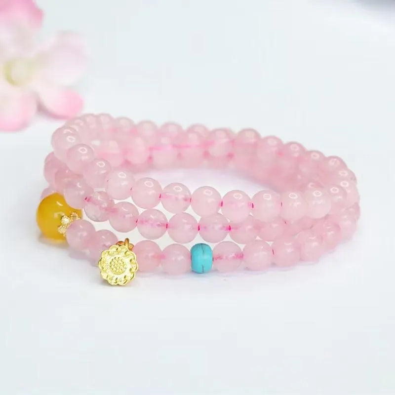 Pink crystal multi-circle bracelet with classic Pi Xui design and artificial crystal construction