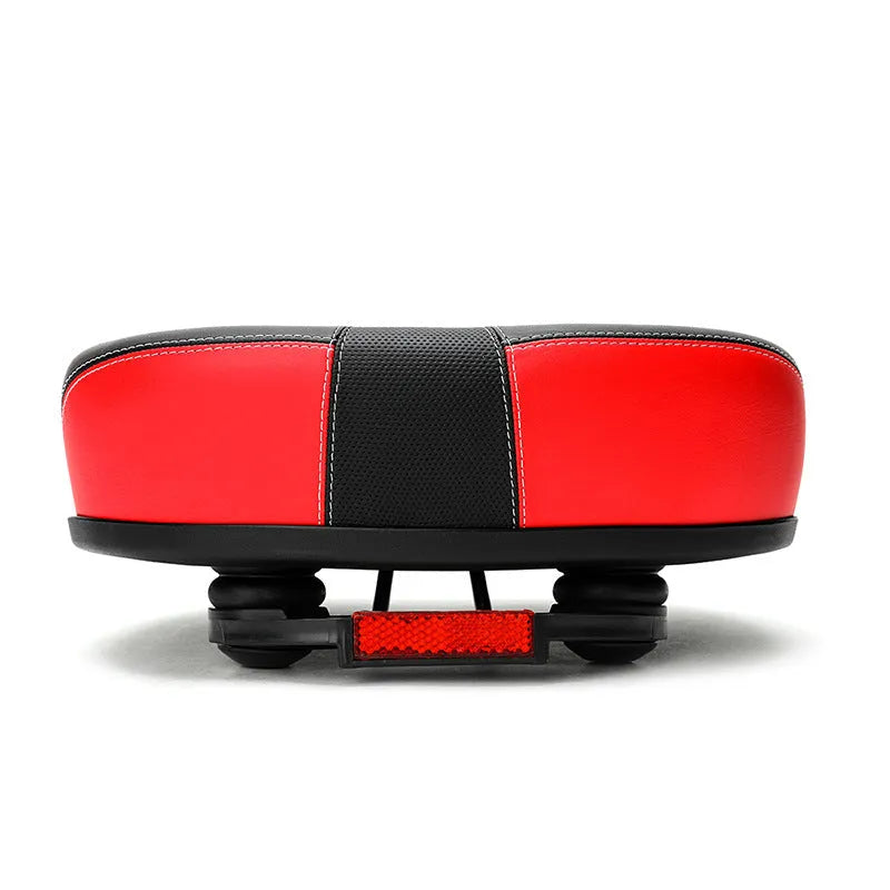 Large thickened bicycle saddle in red, grey, or light brown with reflective stickers.