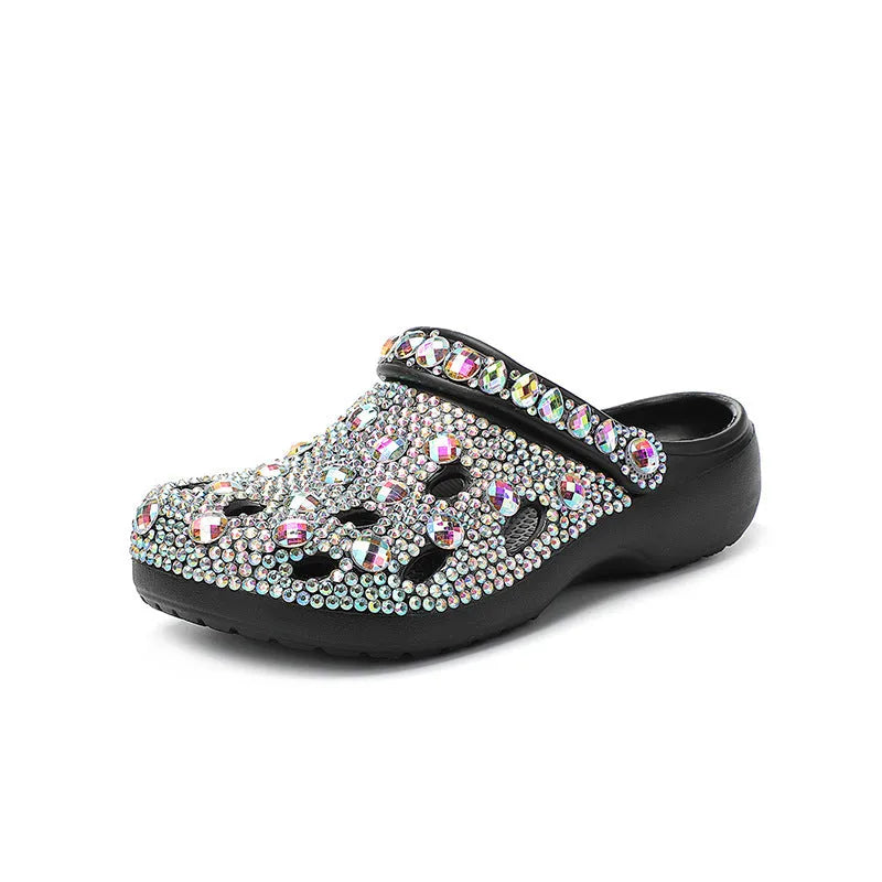 Black platform sandals for women with a rhinestone hole design and EVA construction.