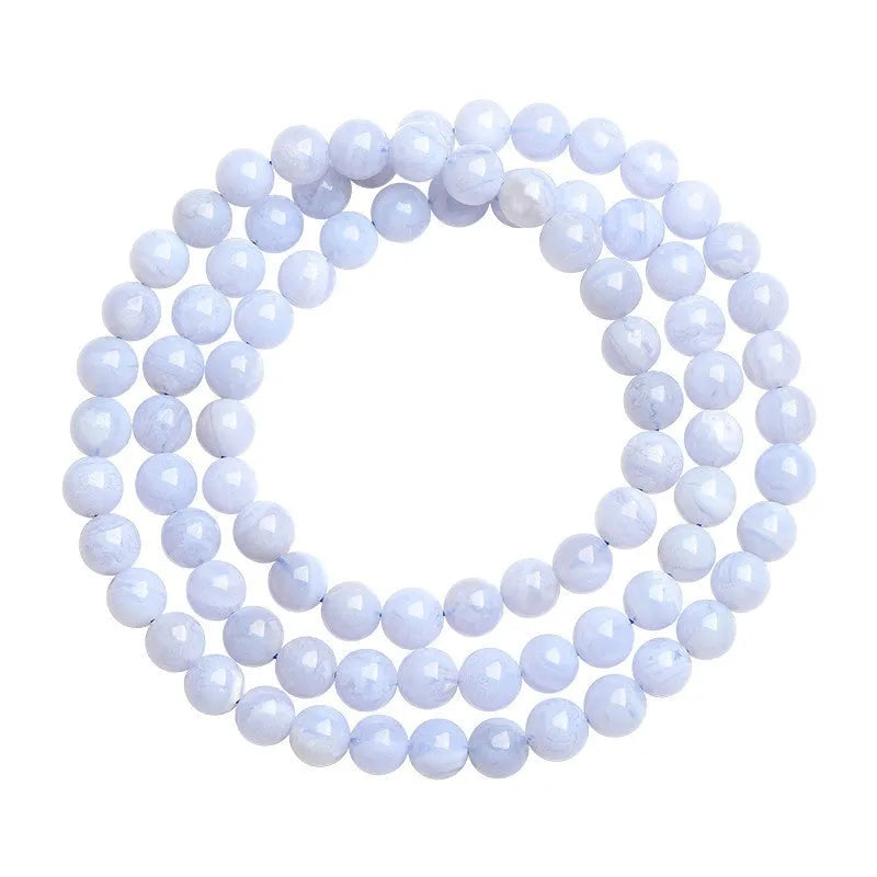 Blue agate bracelet with scattered striped beads and traditional ruyi design elements