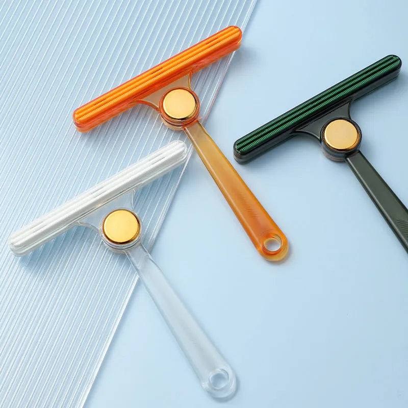 Manual fabric shaver for removing pilling from wool coats and sweaters, AS+TPE construction, 12x14.5x1.5cm, in green colour