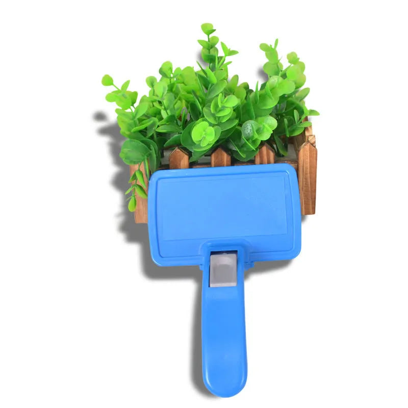 Self-cleaning pet brush comb with durable plastic body, comfortable handle, and 16 x 10 cm size for dogs and cats