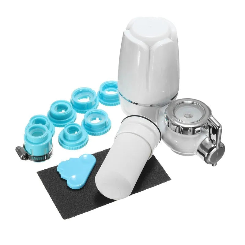 White plastic faucet water filter unit with ceramic core and universal thread adapters for kitchen tap installation.