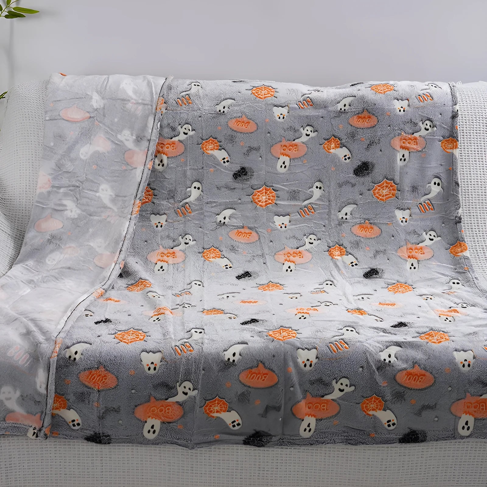 A soft flannel children's blanket with a cartoon pattern, shown in one of five available colours.