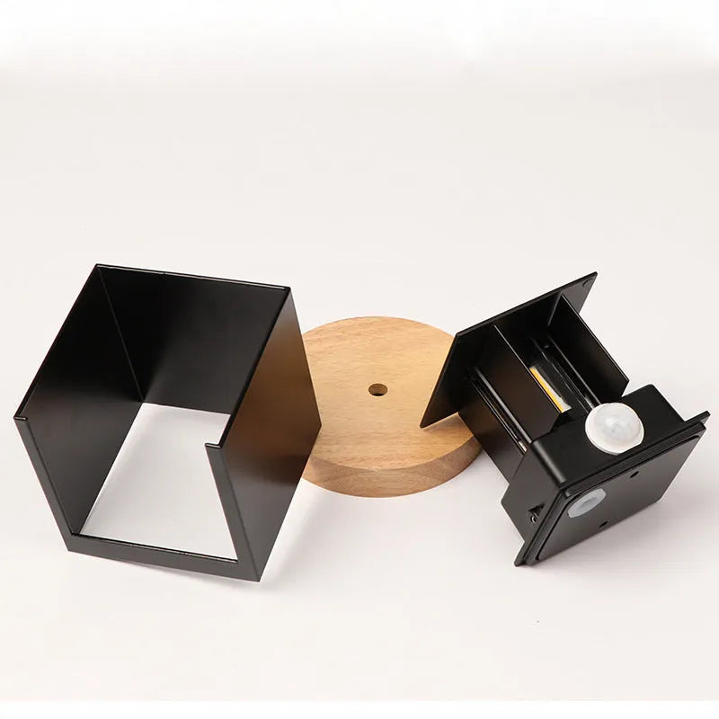 Black adjustable colour temperature aluminium indoor corridor wall lamp mounted on a wall