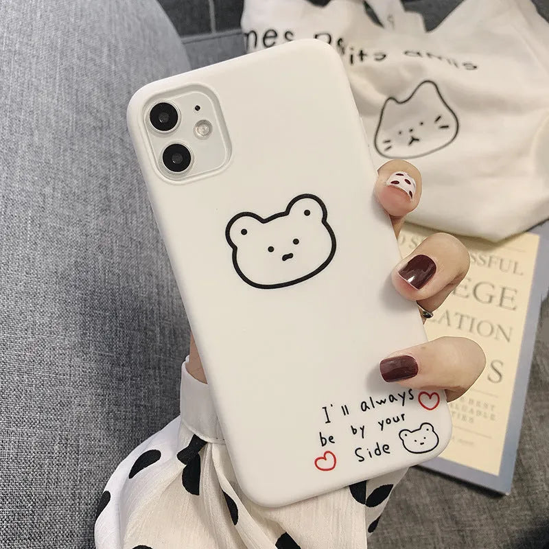 Soft silicone iPhone case featuring a cartoon bear design in Korean style colours.