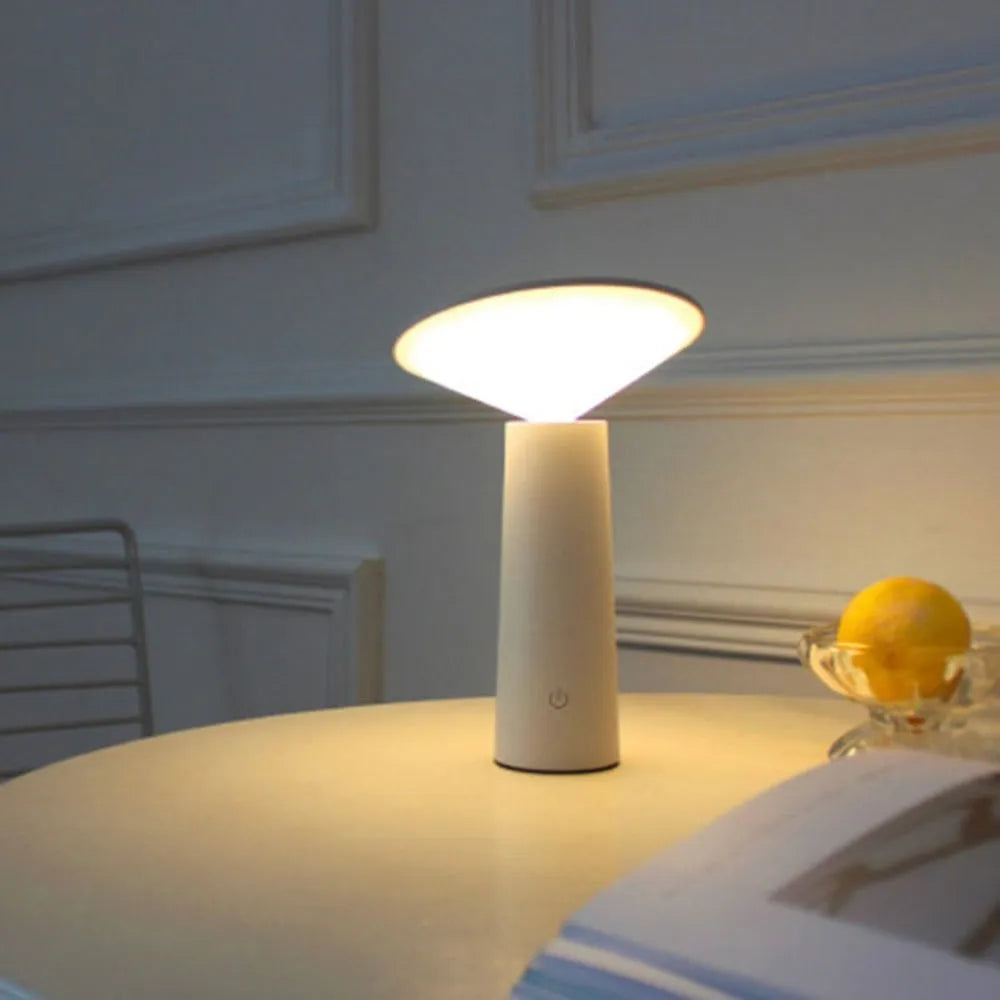 Black or white USB desk lamp with touch sensor, adjustable lamp head, and LED light source