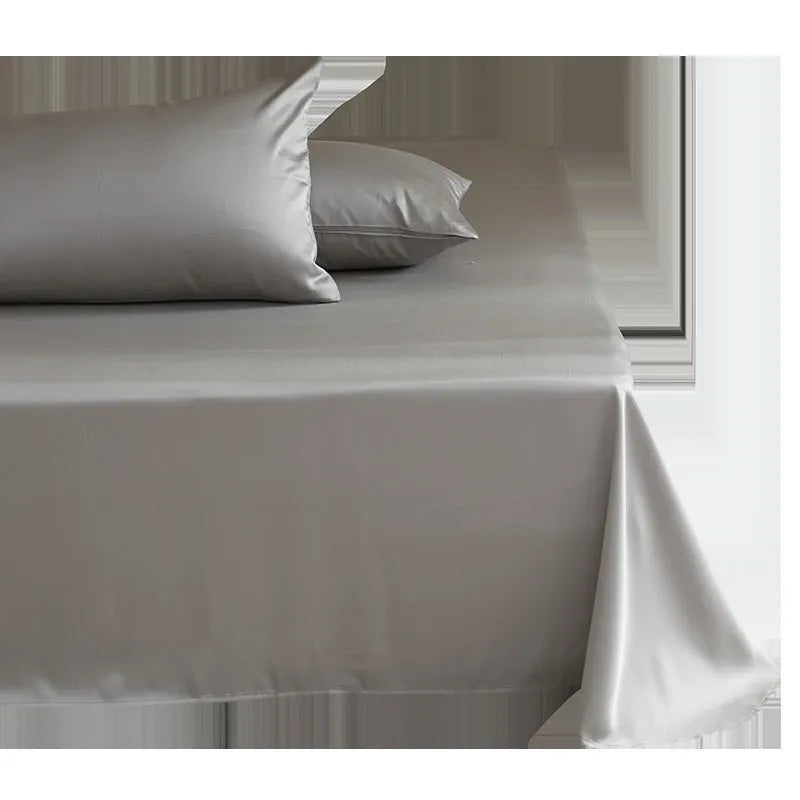 Light grey Tencel Lyocell bed sheet with twill weave, shown folded to display texture and solid colour.