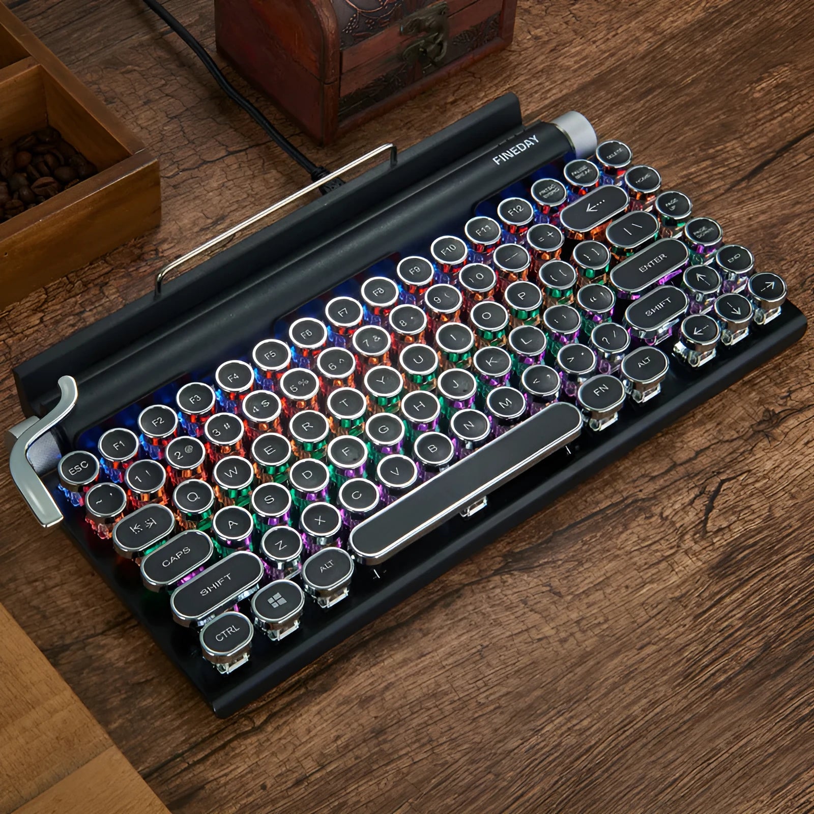 Black dot retro typewriter style Bluetooth mechanical keyboard on a desk.