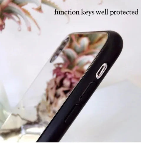 Black iPhone back cover case with a reflective mirror surface and self-timer function.