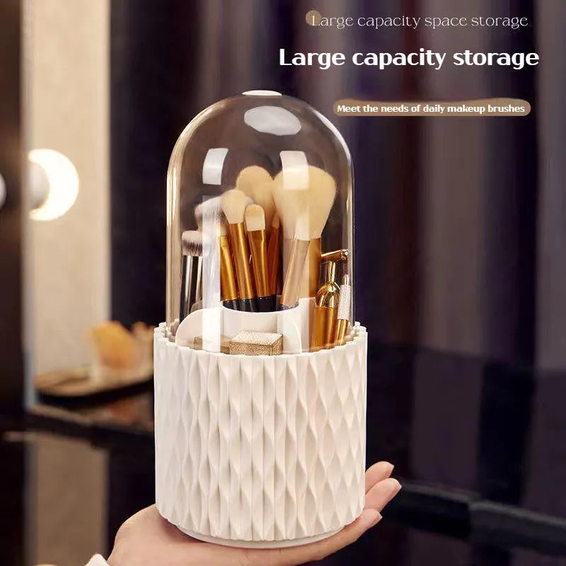 White rotating makeup brush storage box with transparent dust-proof cover on desktop