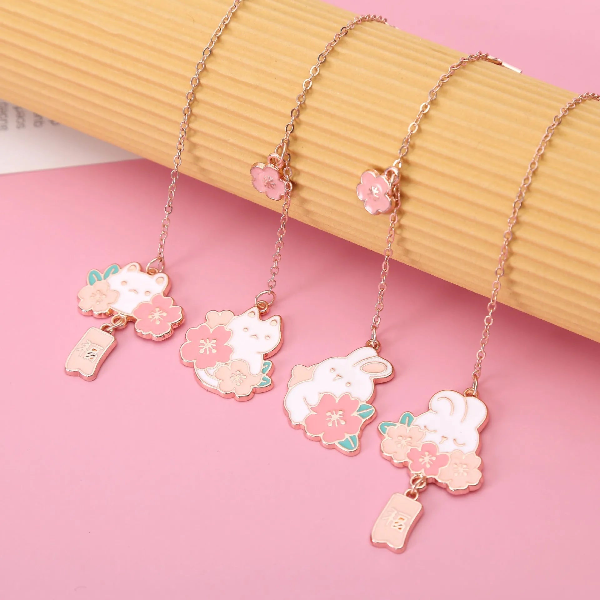 Metal pendant bookmark with cherry blossom cartoon cat design for books and journals