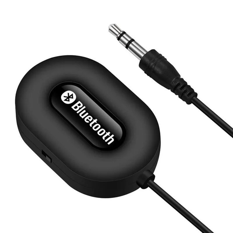 Black B5 Bluetooth music receiver with 3.5mm audio cable and USB charging cable