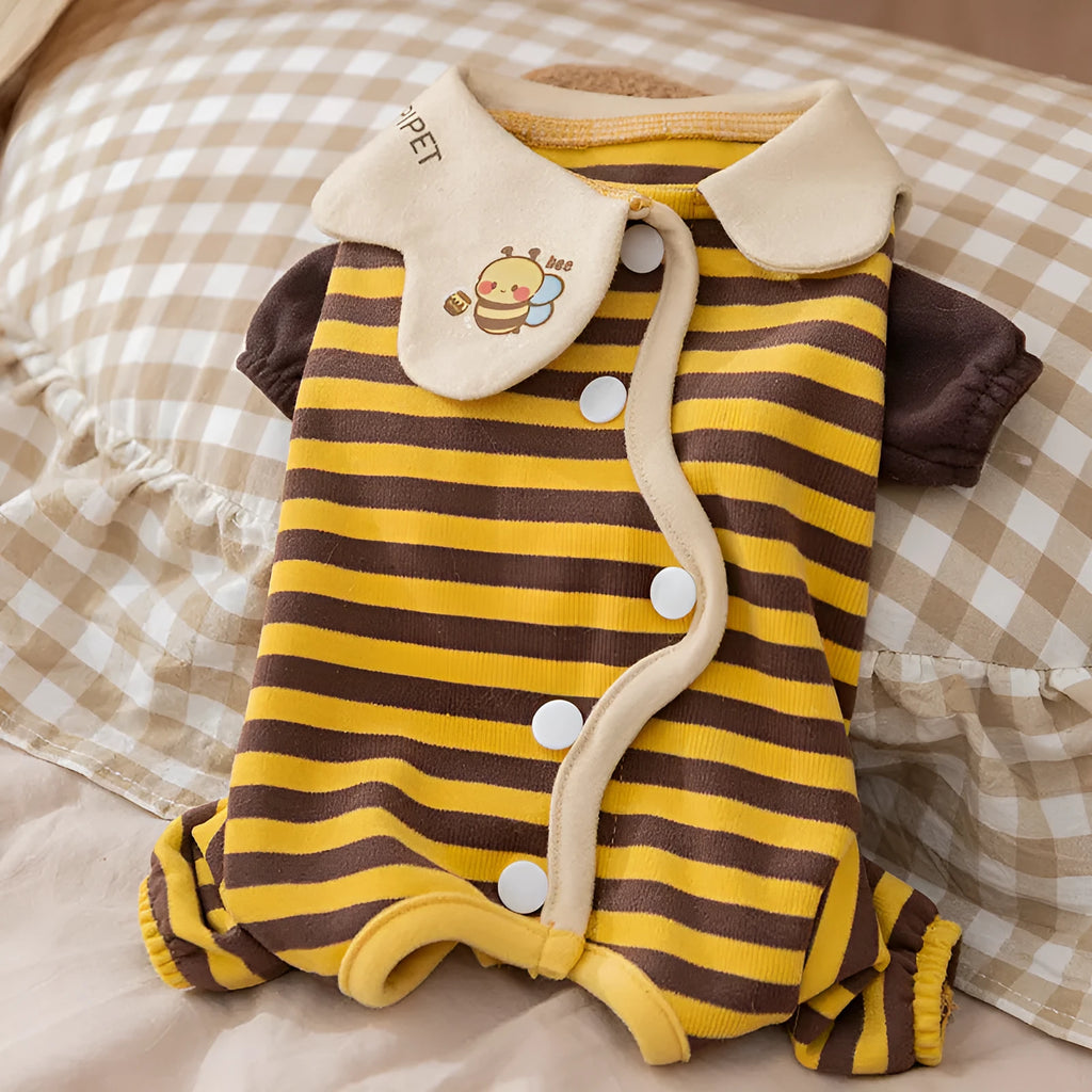 Yellow bee-patterned dog pajamas on small dog, four-legged full coverage suit with lapel collar