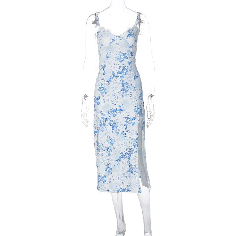 Women's blue lace flower print long dress with a thigh slit and thin suspender straps.