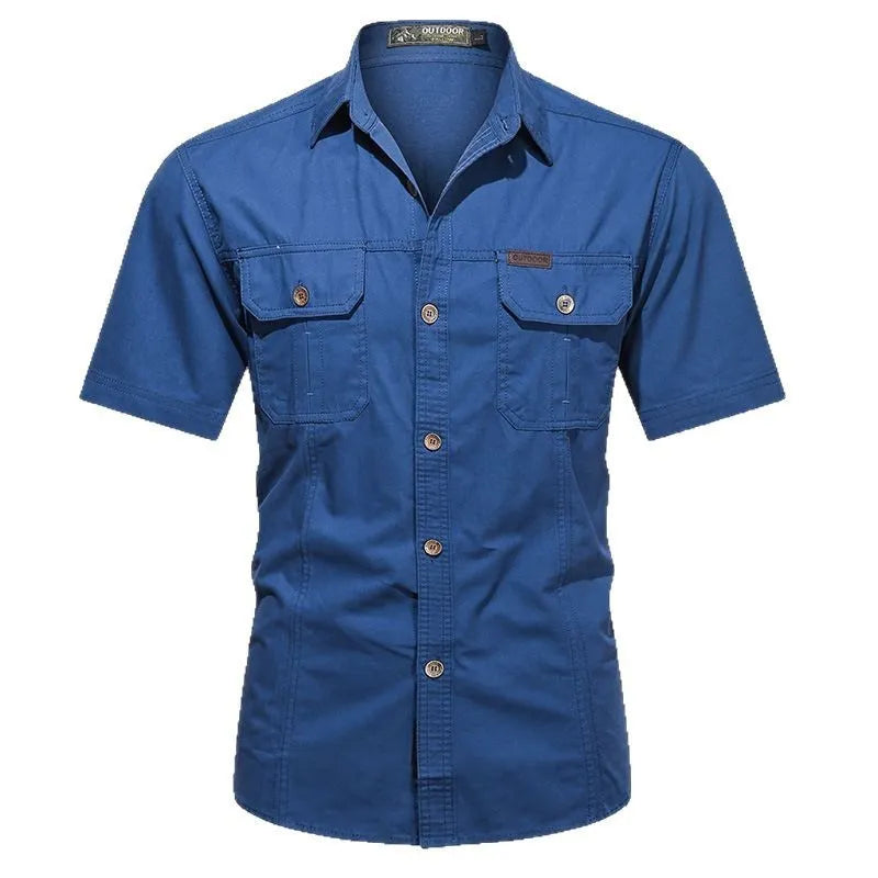 Men's loose fit cotton work shirt in army green with short sleeves and button front.