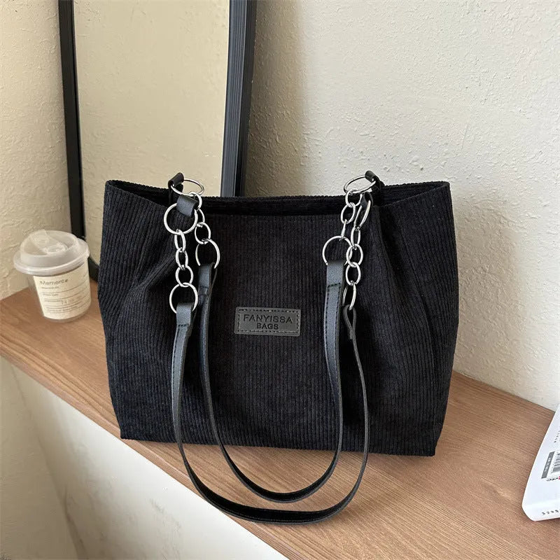 Corduroy one-shoulder tote handbag in square design with three-dimensional pocket