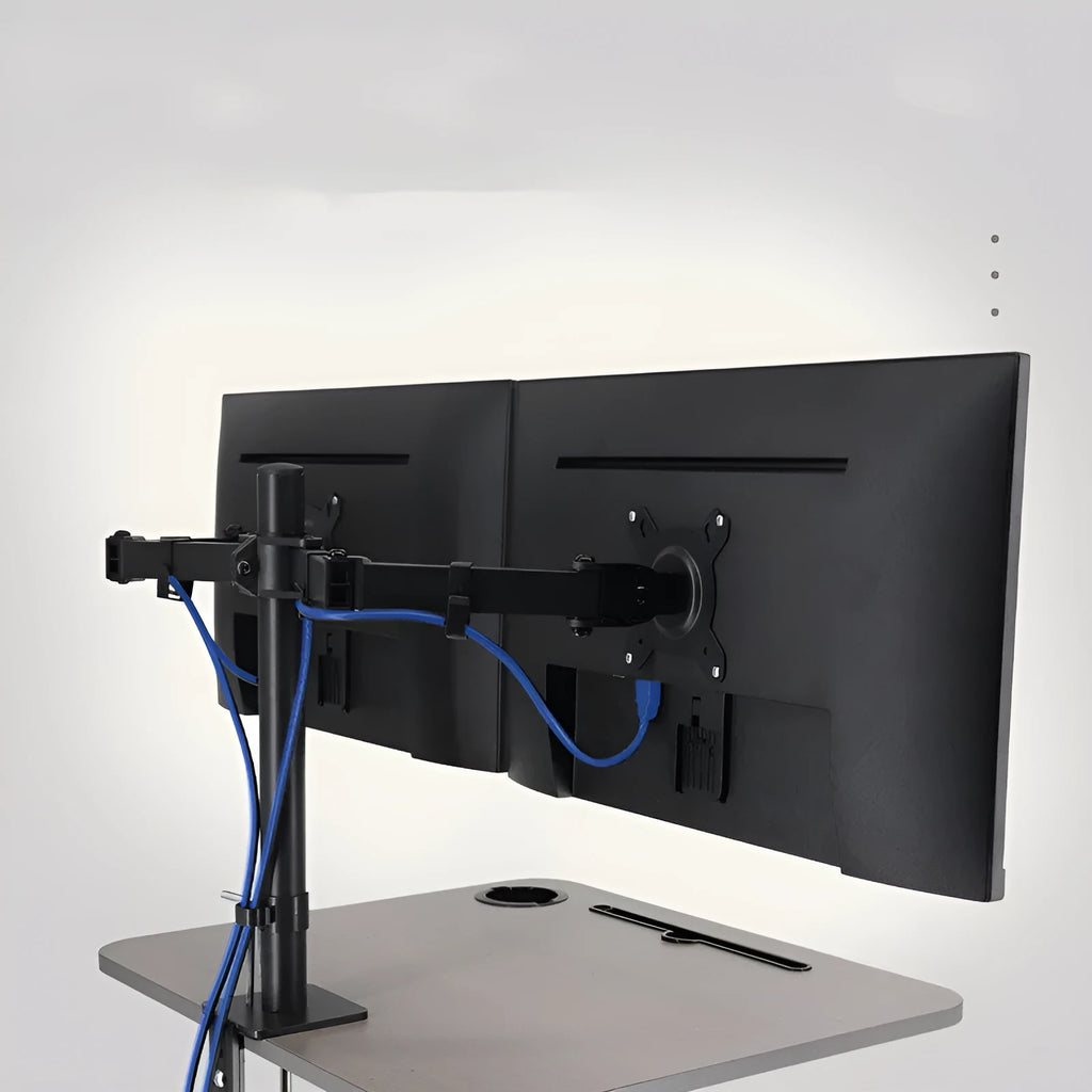 Steel computer monitor lifting rotating bracket arm supporting a screen on a desk