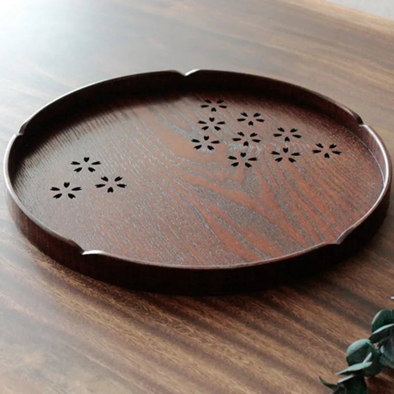 Wooden serving plate with 12 compartments and cherry blossom design measuring 30cm diameter