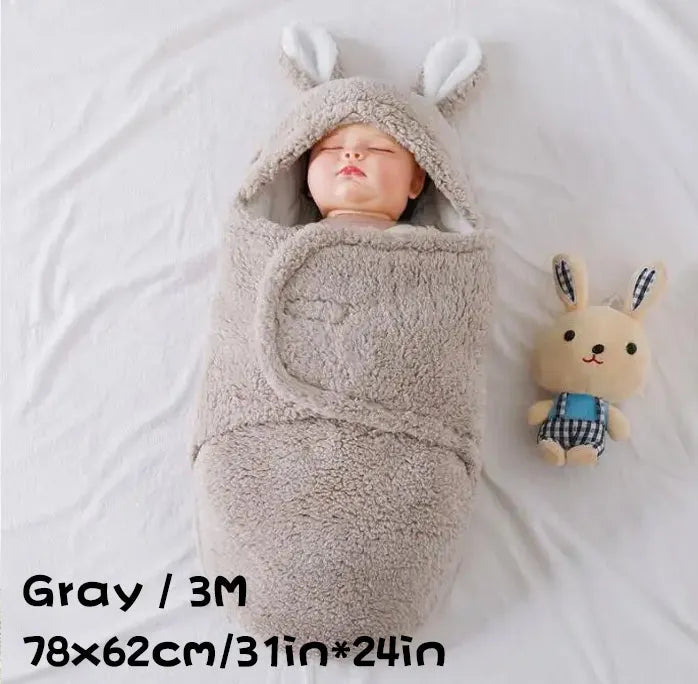 Adjustable baby sleeping bag swaddle blanket showing velcro wings and leg positioner in blue colour