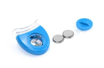 LED teeth whitening kit with button switch and denture tray in blue