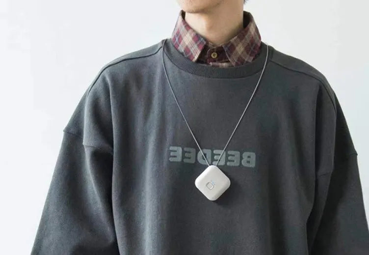 USB portable air purifier necklace in blue, pink, grey or white colour options.