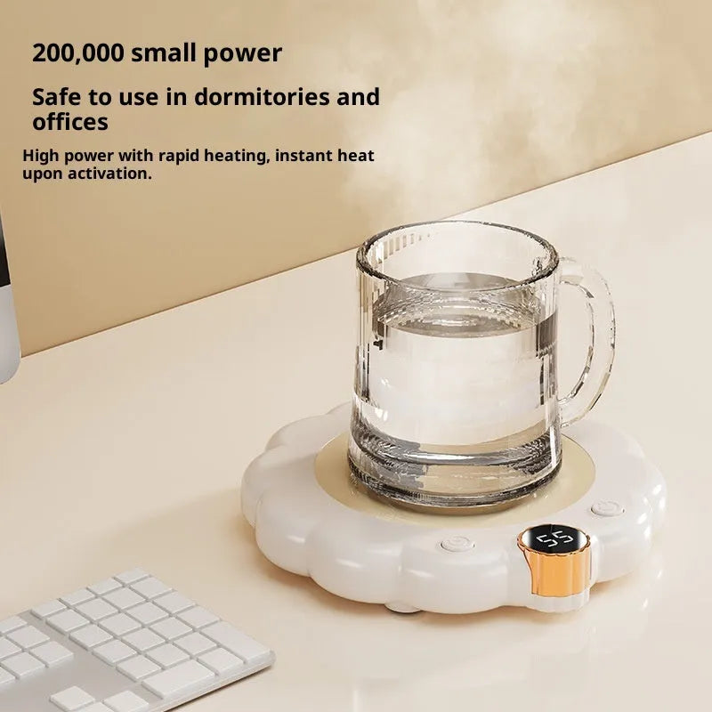 White plug-in thermal coaster on desk with push-button controls and power cord