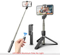 Black aluminium alloy selfie stick tripod with 5-inch ring fill light holding a smartphone, extended to show pole height