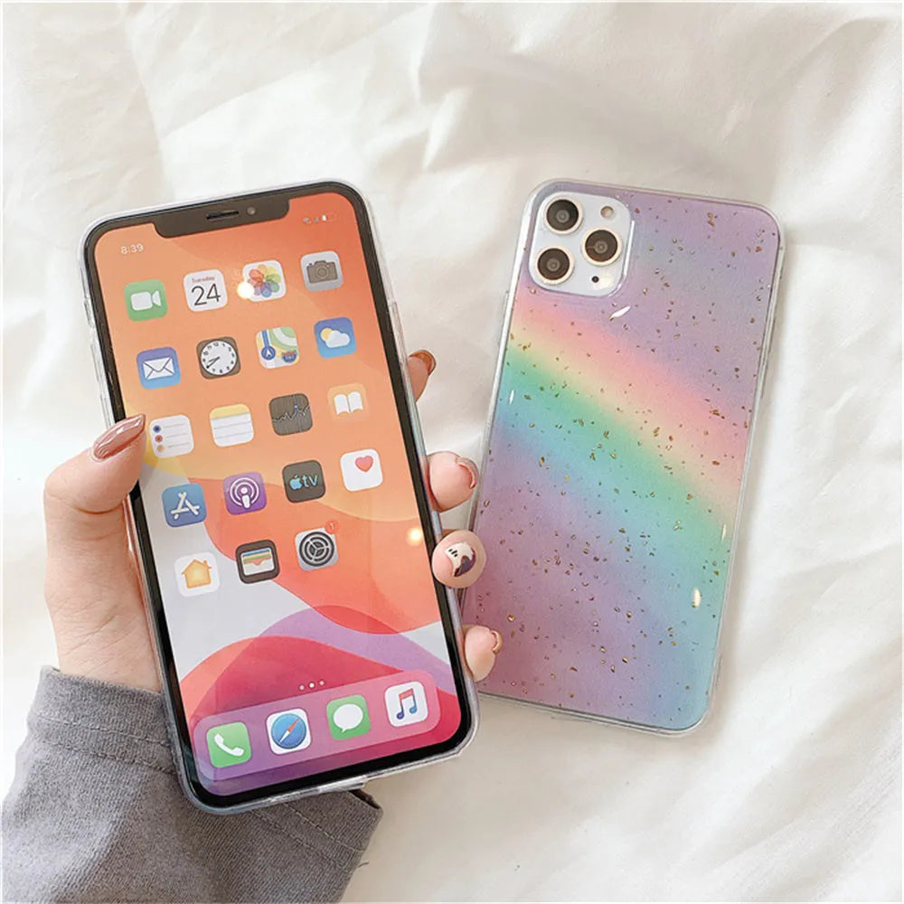 Rainbow gradient striped TPU protective case for iPhone models on a white background.