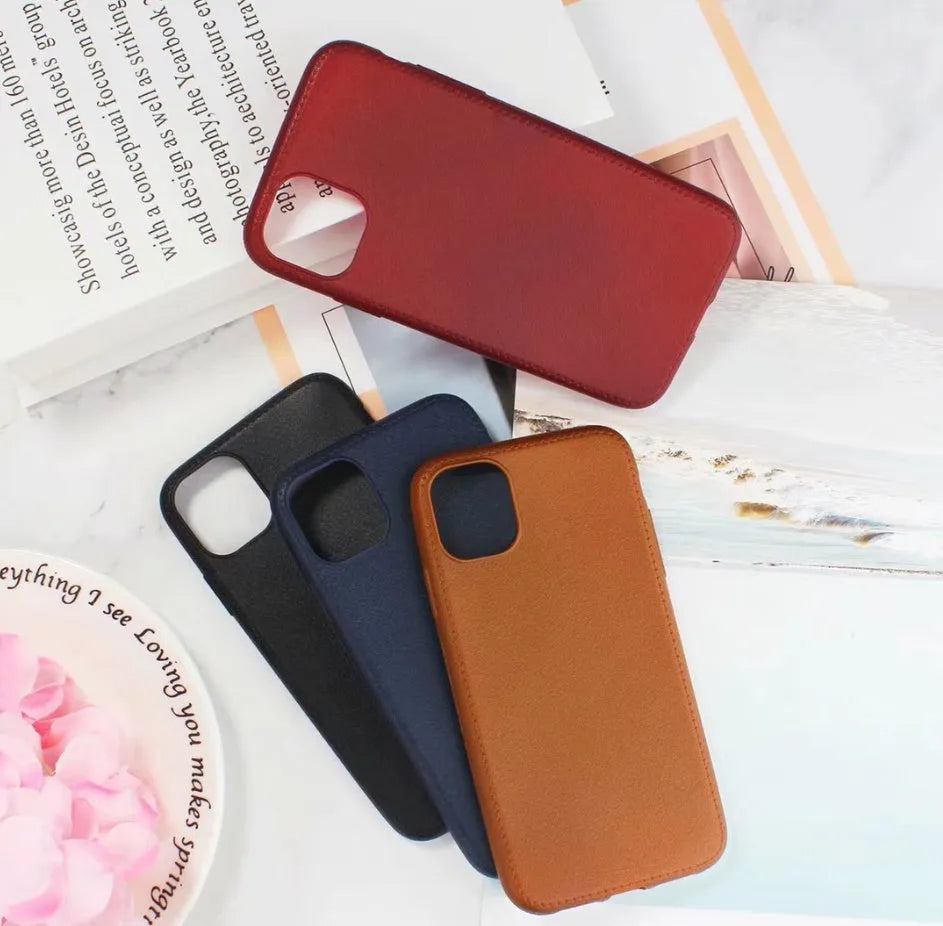 Slim leather and TPU iPhone case shown in black, brown, navy blue, and wine red colours