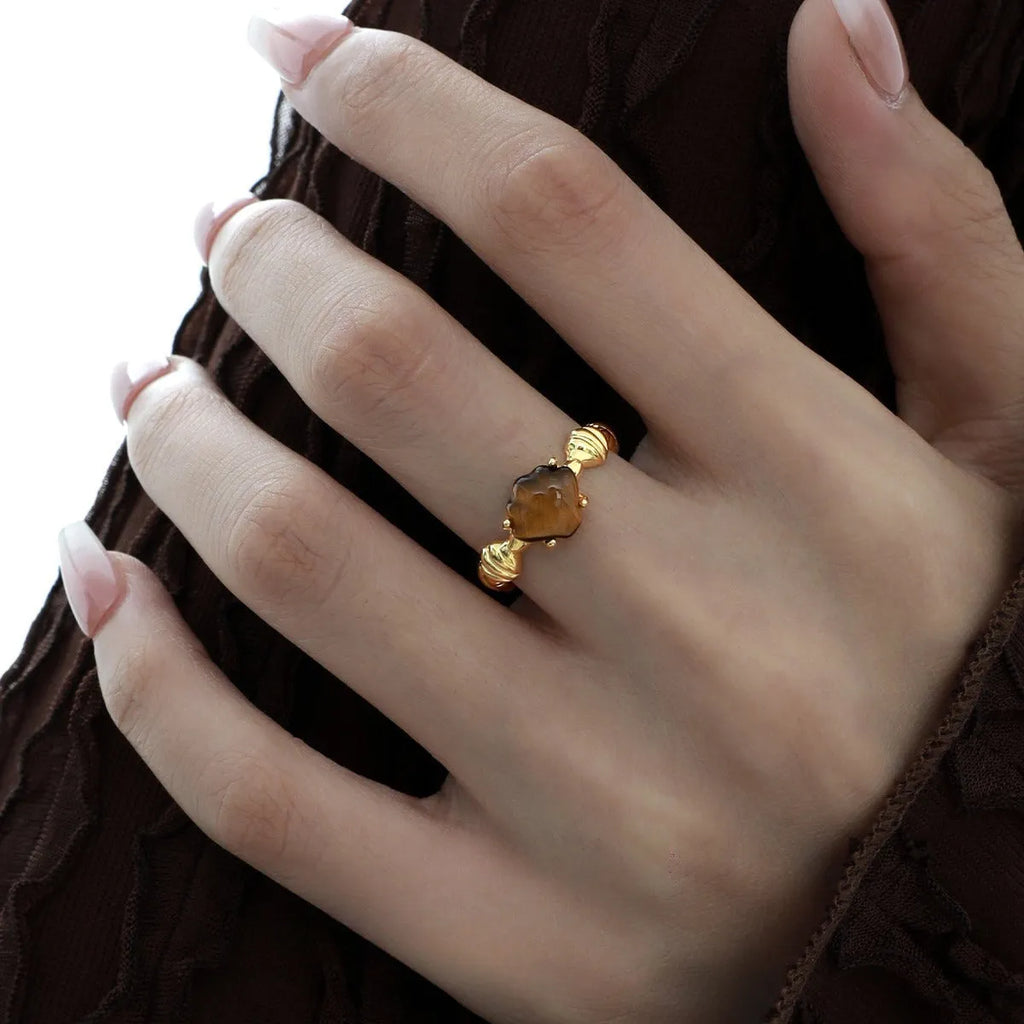 Adjustable silver ring with shell design and tiger eye gemstone in gold electroplated finish