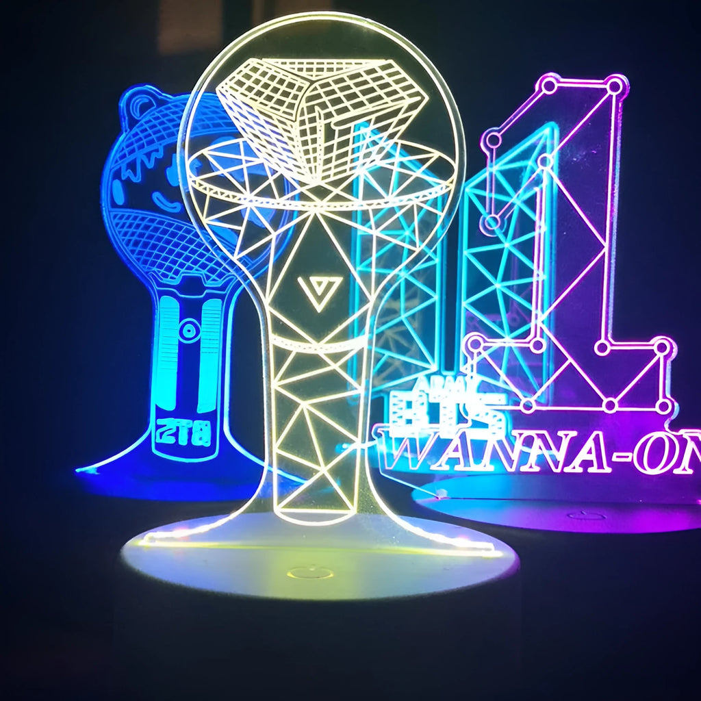 Clear acrylic display stand supporting 101 Tower Gem BTS lamp with universal voltage compatibility