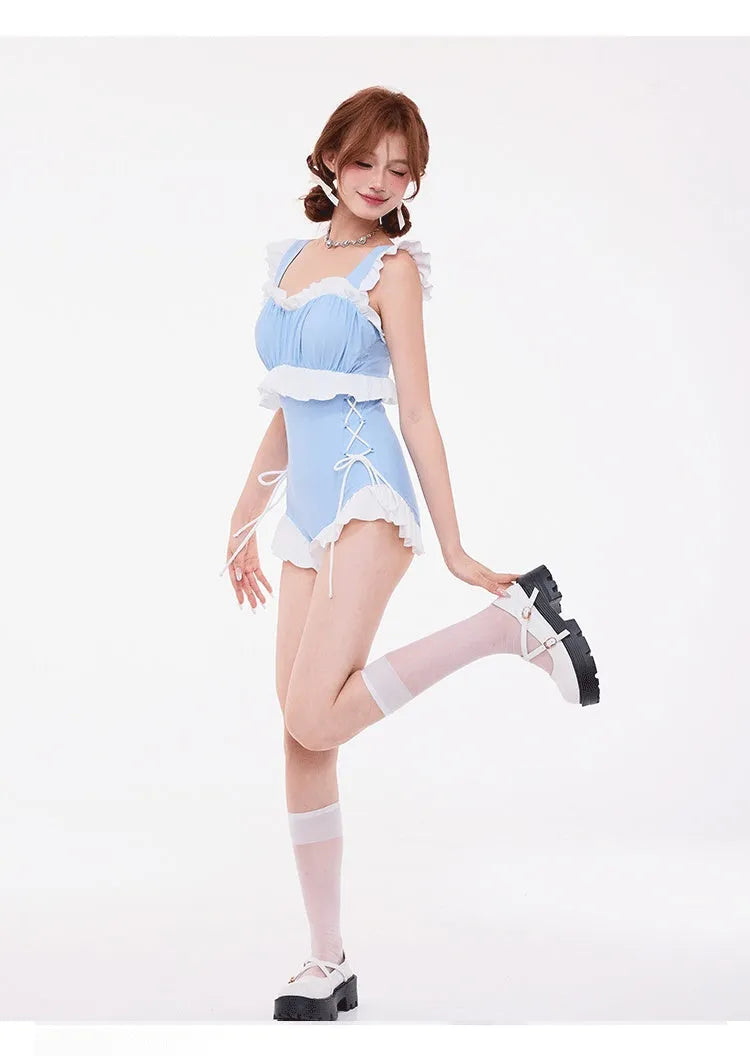 Light blue women's high-waist swimsuit with lace chest detail and backless design