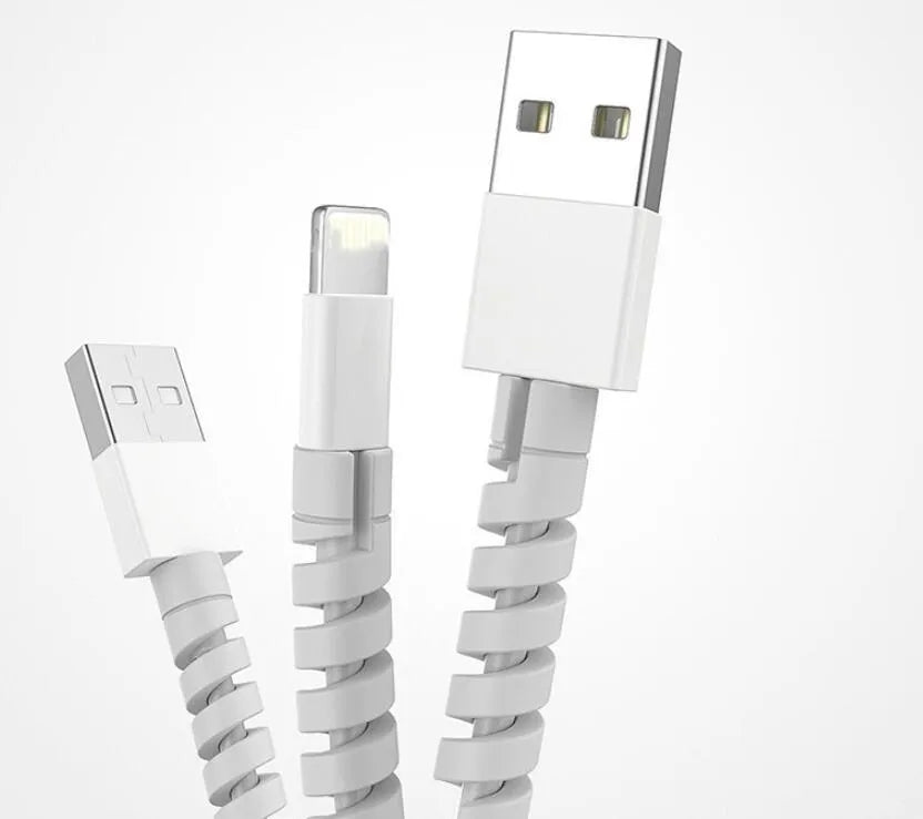 Two plastic cable protectors, 3.5cm long, in assorted colours next to a charging cable.